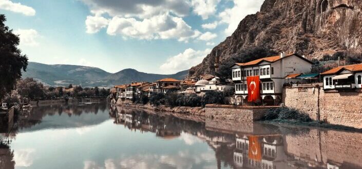 Buildings Beside Calm Body of Water